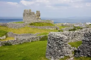 Wall Prints: Ruins of the medieval O'Brien castle among small stone-walled fields