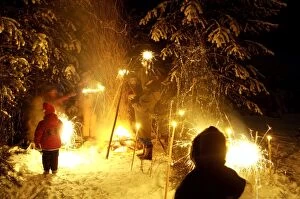 A Russian family celebrates New Year by a bonfire