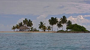 Sailing by Goff Cay Island in Belize