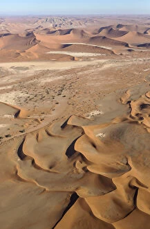 Camelthorn Gallery: Sand dunes in the Namib Desert- top centre the Witberg