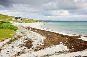 House Gallery: Sandy beach and croft on Berneray (Bearnaraigh), with the Sound of Harris beyond, Outer Hebrides