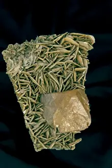 Scheelite Crystal (CaWO4) (bottom) on Muscovite - China - Scheelite is calcium tungstate usually with some of the tunsten replaced by molybdenum - It is fluorescent
