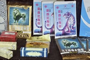 Images Dated 13th August 2011: Selection of traditional Chinese medicine products featuring tiger parts and other animals