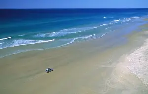 Seventy-five Mile Beach with 4WD vehicle; aerial, Fraser Island, Queensland, Australia JPF34617