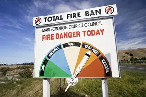 Fires Prints: Sign - board on roadside displaying daily fire warning as very high South Island