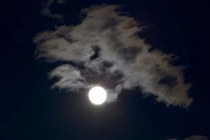 Images Dated 23rd April 2005: Siilhouette of clouds at night - backlit by new moon UK