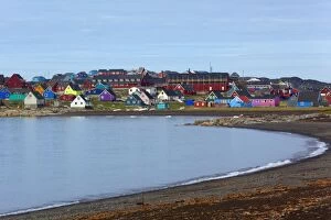 Sisimiut colourful houses along coastal edge Summer