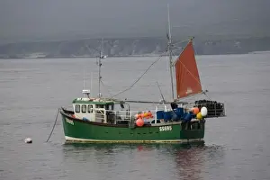 Boats Prints: Small fishing boat moored in Port Asaig Isle of Islay Scotland UK