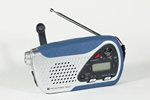 Images Dated 5th April 2009: Small windup clockwork dual band radio with with in torchlight and battery options UK