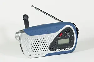 Light Prints: Small windup clockwork dual band radio with with in torchlight and battery options UK