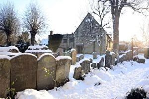 Burford Gallery: Snow covered Church and Graveyard