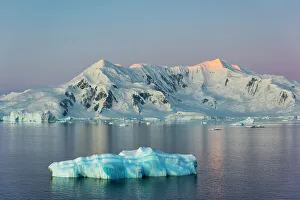 Iceberg Gallery: Snow covered island and floating ice in South Atlantic
