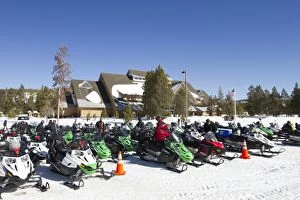 Snowmobile rally at Old Faithful