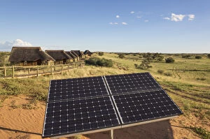 Solar panel and the chalets of of the Rooiputs Lodge