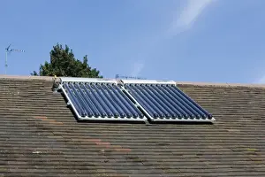 Solar thermal panels with evacuated tubes on roof of Worcestershire House provide domestic hot water UK