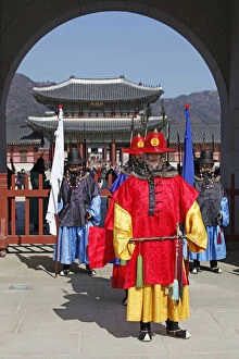 Soldiers in traditional Korean costume changing