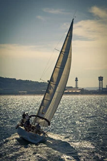 Spain, Barcelona. Sailboat catching