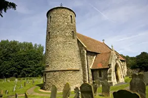 Norfolk Prints: St Marys Church with round stone tower Burnham Deepdale Norfolk UK