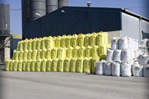 Images Dated 8th September 2007: Stacks of fertiliser sacks on dockside St Malo Brittany, France