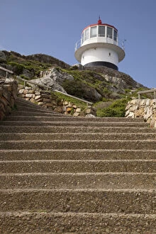 Stairs leading to lighthouse atop hill