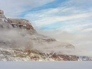 Uummannaq Collection: Storen Island, frozen into the sea ice of the Uummannaq fjord system during winter