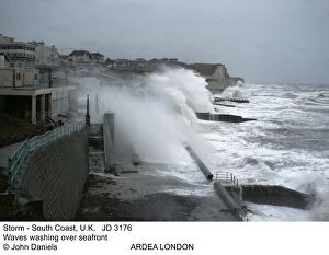 Tides Gallery: STORM - Waves washing over seafront