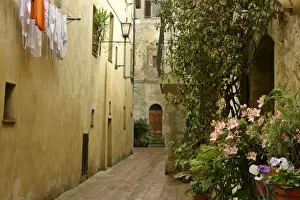 Pienza Prints: Street scene in Pienza historic building in the city centre of Pienza Val d Orcia