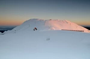 Summit of Mount Buller covered in snow at sunrise.with