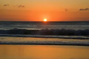 Sunsets And Sunrise Prints: Sunrise over ocean - the sun is rising on the horizon over the ocean