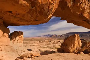 Arches Prints: Sunset Arch - rock arch framing Navajo Mountain in the background - Grand Staircase Escalante National Monument