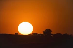 Alentejo Gallery: Sunset - with atmosheric haze caused by dust Castro