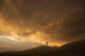 Sunset with cloud build up over the Brandberg Massive. Namib Desert Namibia, Africa