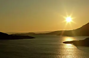 Tranquillity Prints: Sunset over Loch Broom with sun still up casting red light over water