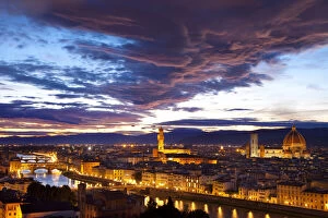 Sunset over River Arno and renaissance town
