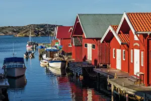 Port Prints: Sweden, Bohuslan, Kungshamn, red fishing shacks in the Fisketangen