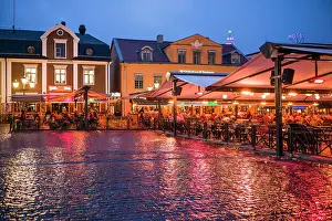 Sweden, Linkoping, cafes and bars on Stora target square, dusk Date: 18-05-2019