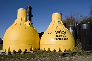 Tanks - Large yellow plastic Wisy rainwater storage tank. Green Shop Bisley UK