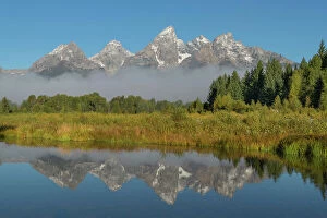Images Dated 8th February 2022: Teton Range reflected in still waters of the Snake River at Schwabacher Landing