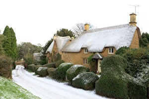 Houses Gallery: Thatched Cottages - covered in light snow