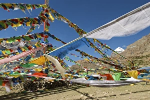 Images Dated 11th June 2006: Tibet Sacred Mt Kailash and prayer flags - (Pilgrims walk the kora 52km around the mountains base)