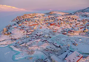Town Uummannaq during winter in northern West Greenland beyond the Arctic Circle. Greenland, Danish territory Date: 05-03-2020