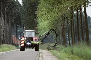 Tractor - cutting roadside grass verge