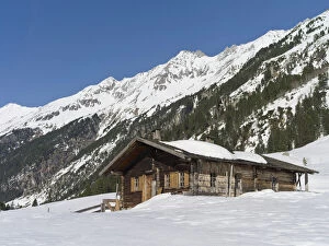 Traditional wooden mountain hut or Alp in