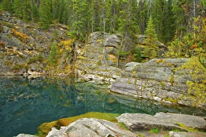 Alberta Gallery: Trees, rocks, and cliffs reflect in