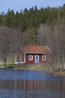 Solitary Gallery: Typical swedish hut at a river - Vaermland, Sweden