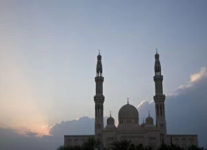 Backlit Gallery: UAE, Dubai. Mosque with palm trees in front