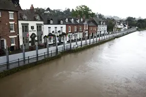 Floods Prints: UK - Flood barriers protecting riverside houses along rising River Severn Bewdley Worcestershire
