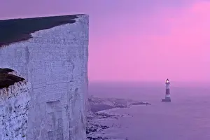 Dusk Prints: UK - lighthouse at Beachy Head with steep chalk cliffs at sunrise