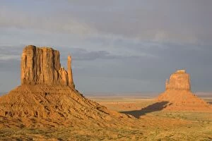 Images Dated 5th April 2005: USA - The shadow of West Mitten Butte crawls up East Mitten Butte, the two most prominent