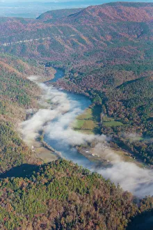 Color Collection: USA, Tennessee. Morning fog Hiwassee River, Blue Ridge fall color Date: 08-11-2020